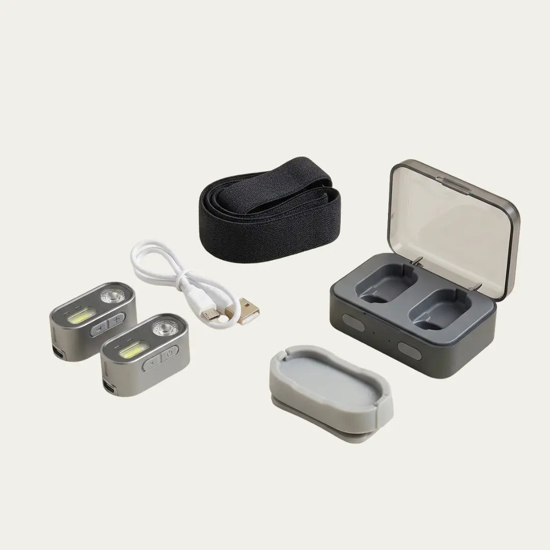 Contenu du pack : deux lampes frontales rechargeables, boîtier de recharge, bandeau, support et câble USB